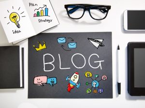 Blog concept top view with black and white workstation